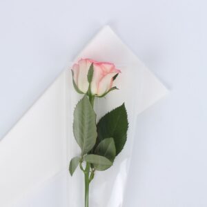 FOL-TAS-02-111 Díszcsomagoló fólia virágtasak - 50 ív/csomag [45cm x 12cm] fehér/átlátszó